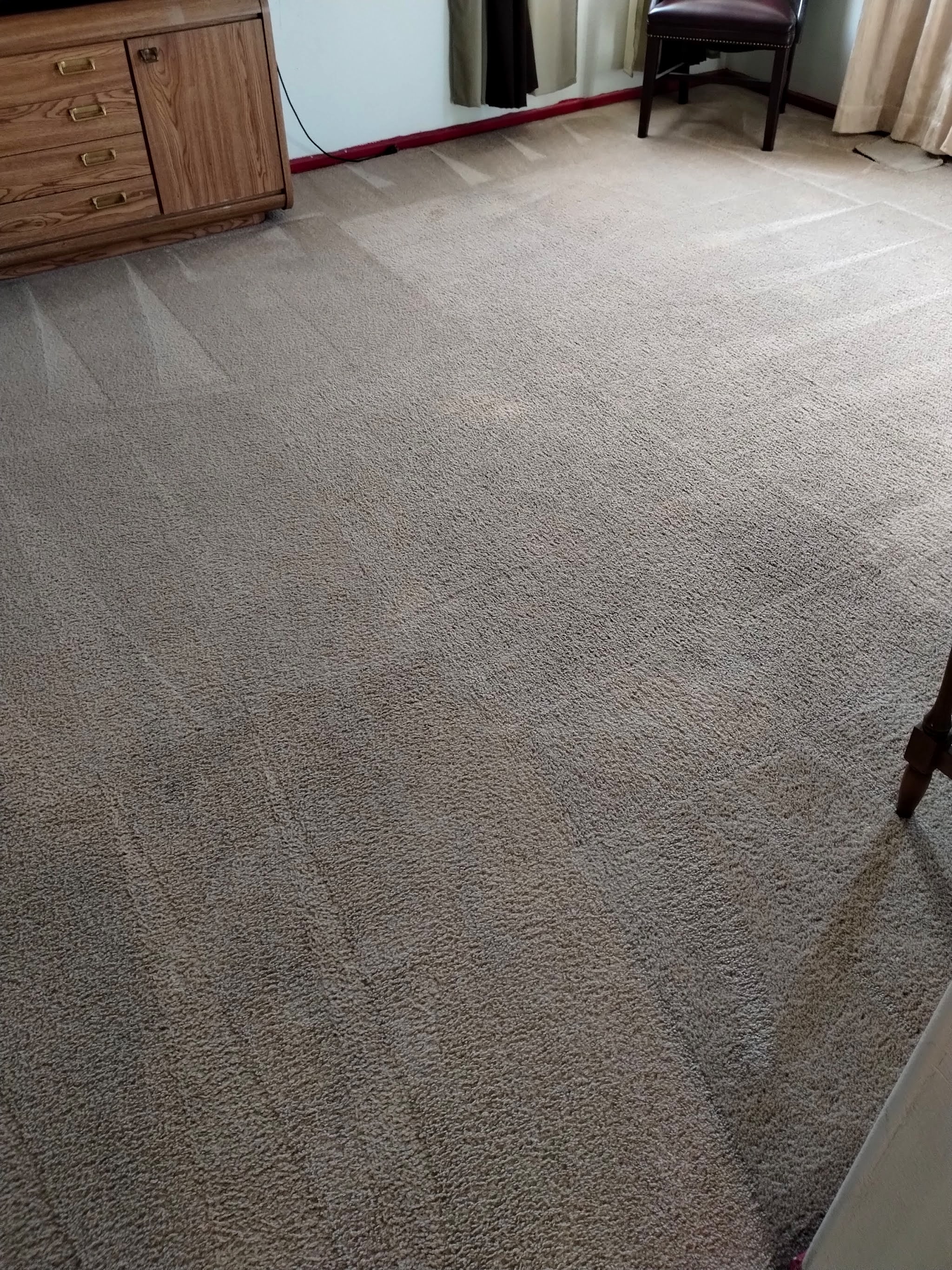 Bedroom carpet freshly cleaned with wand lines